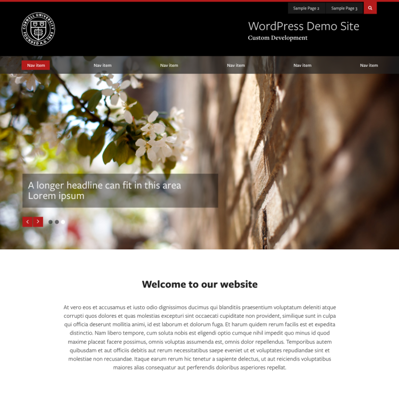 homepage mockup with a black bar and white insignia with image of flowers below