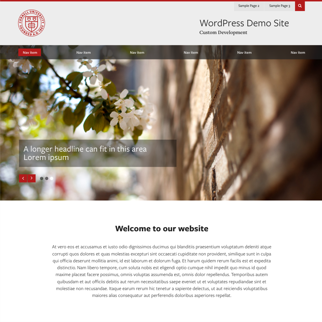 homepage mockup with a gray bar and red insignia with image of flowers below